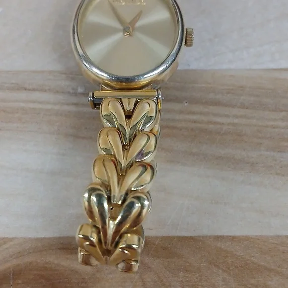 Movado Faceless Gold Womens Watch